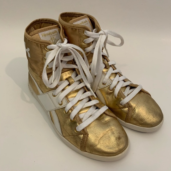 gold reebok high tops